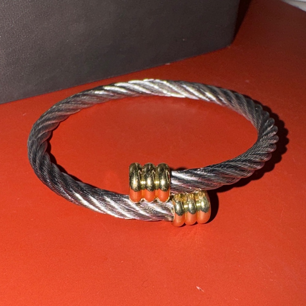Elegant Gold and Silver Twist Bracelet